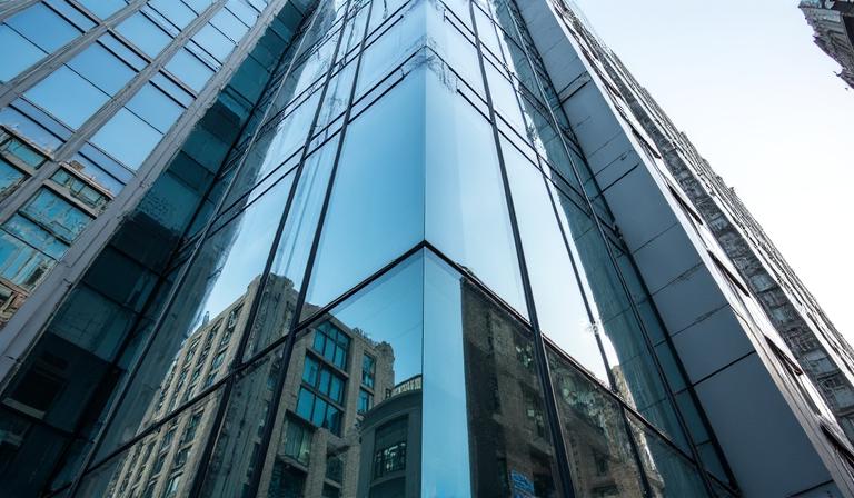 Exterior of a modern professional building on Chiswell Street, London